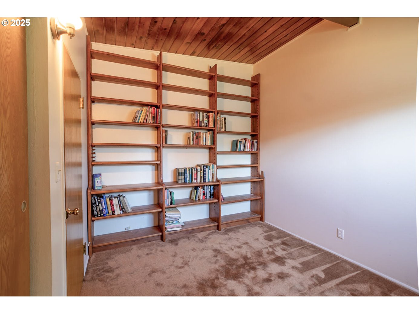 1439 Barton Street Eugene, OR 97404 - Photo 20 of 30 a view of a bedroom with furniture and staircase