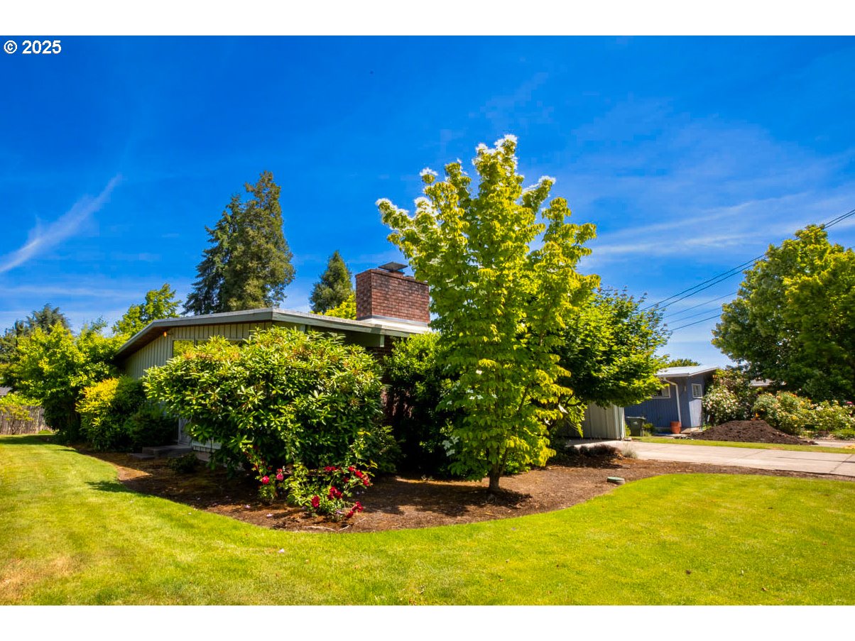 1439 Barton Street Eugene, OR 97404 - Photo 2 of 30 a view of a house with a yard