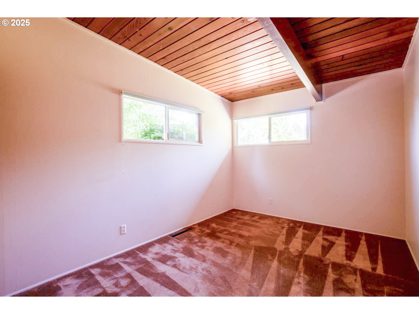 1439 Barton Street Eugene, OR 97404 - Photo 22 of 30 a view of an empty room with a window