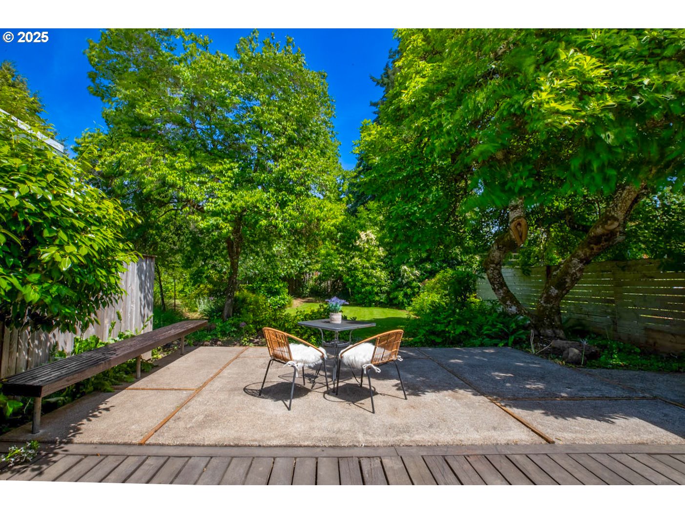 1439 Barton Street Eugene, OR 97404 - Photo 26 of 30 a view of a bench in the backyard of a house