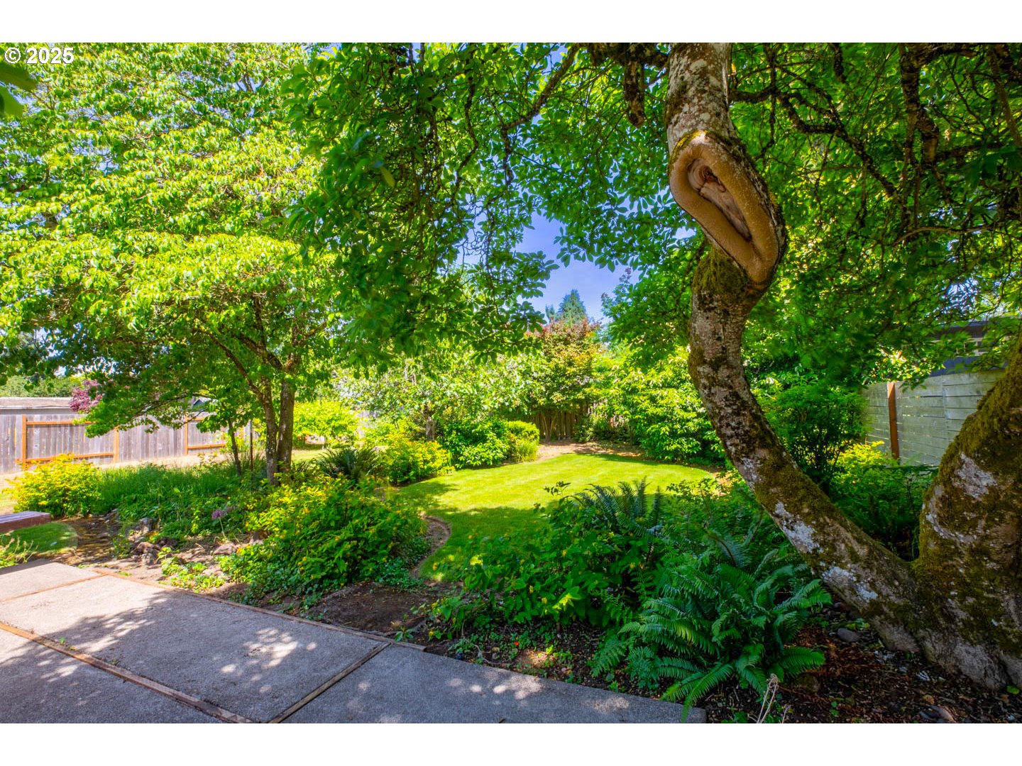 1439 Barton Street Eugene, OR 97404 - Photo 30 of 30 a backyard of a house with a yard and outdoor seating
