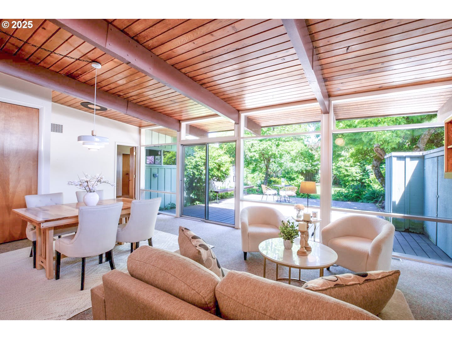 1439 Barton Street Eugene, OR 97404 - Photo 9 of 30 a living room with furniture and large windows