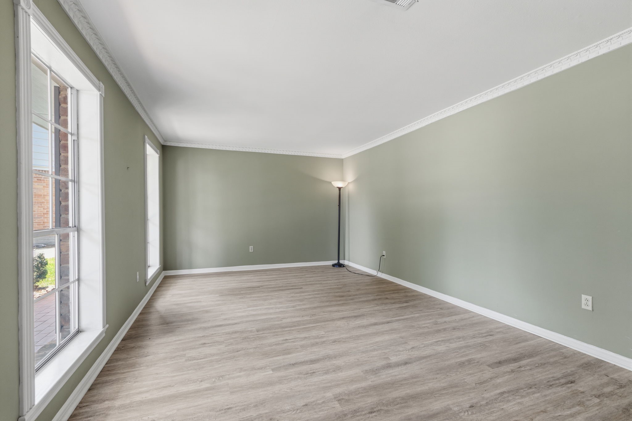 3422 Candlewisp Drive Spring, TX 77388 - Photo 19 of 50 FORMAL LIVING ROOM - This spacious room faces the front of the home. It could be used as a living room, home office, game room or downstairs playroom. It is a very versitale space.