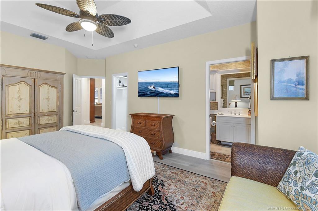 2109 Southeast Talbot Place Stuart, FL 34997 - Photo 20 of 59 Second bedroom with ensuite bath and walk-in closet