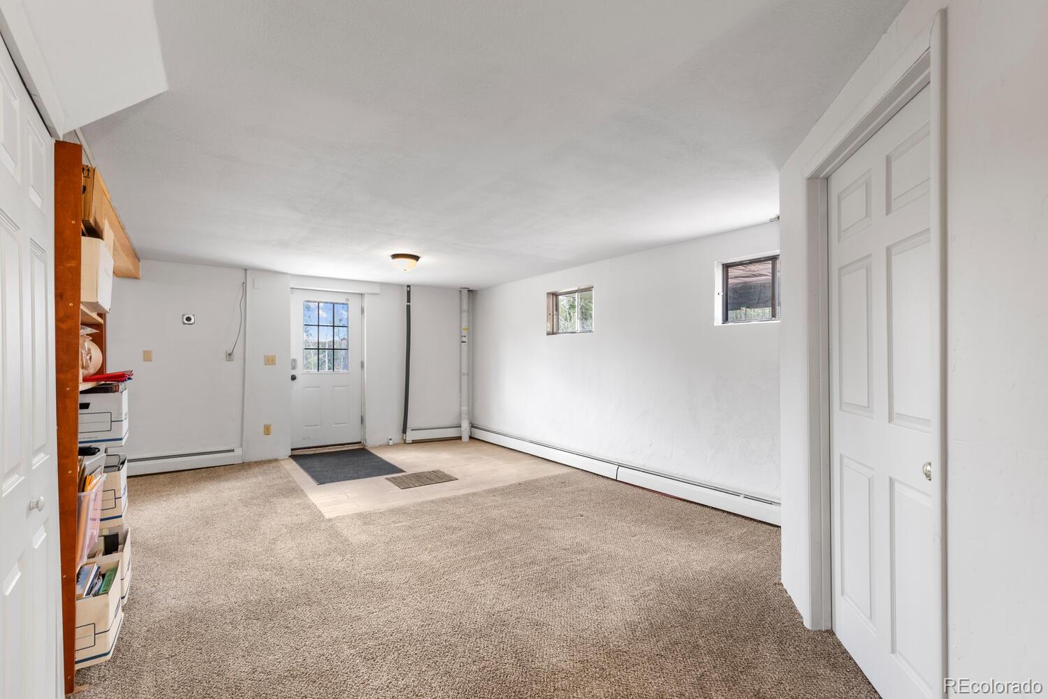 8600 South Warhawk Road Conifer, CO 80433 - Photo 44 of 50 an empty room with closet and a window