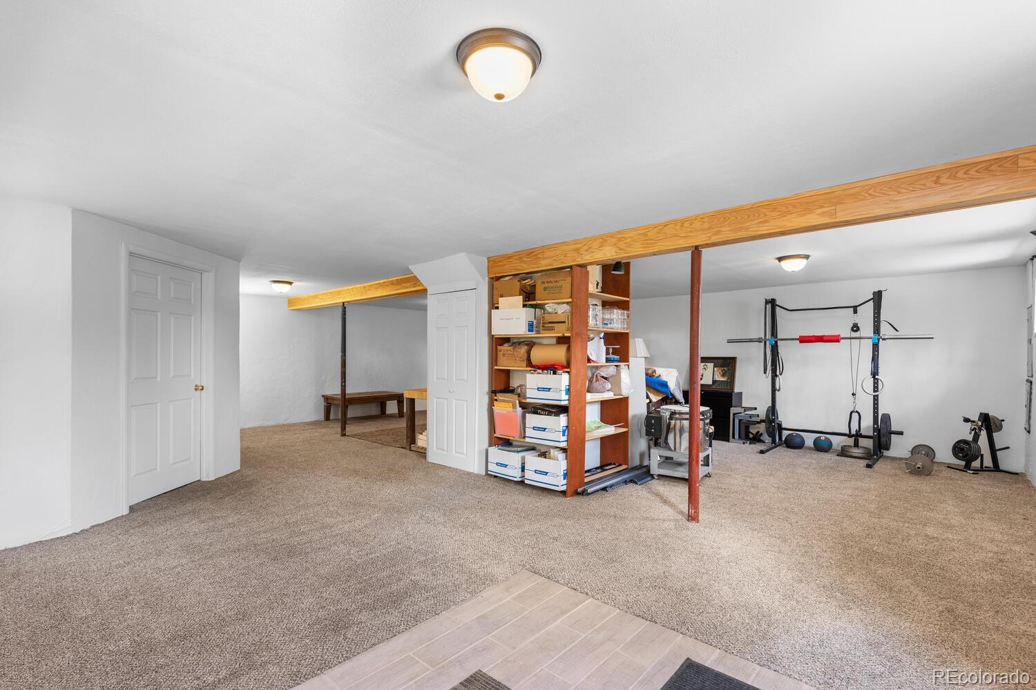 8600 South Warhawk Road Conifer, CO 80433 - Photo 45 of 50 a view of a room with gym equipment