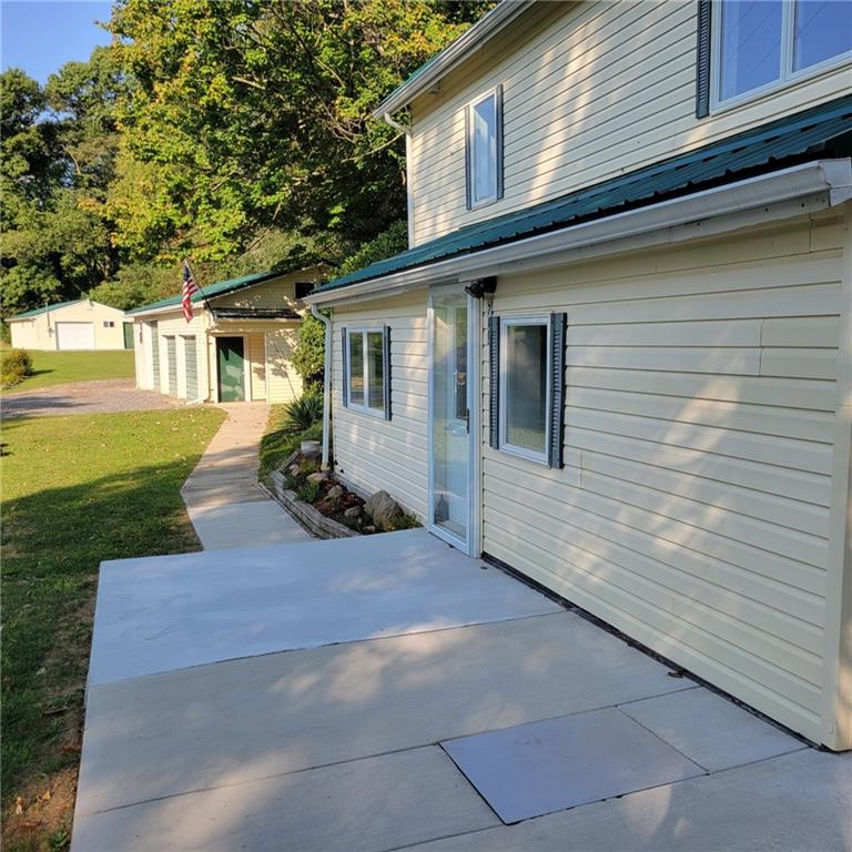 780 West Park Road Slippery Rock, PA 16057 - Photo 1 of 40 a front view of a house with garden