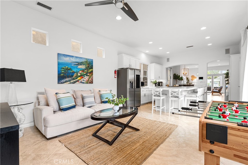 513 Pecan Avenue Huntington Beach, CA 92648 - Photo 17 of 46 a living room with furniture and kitchen view