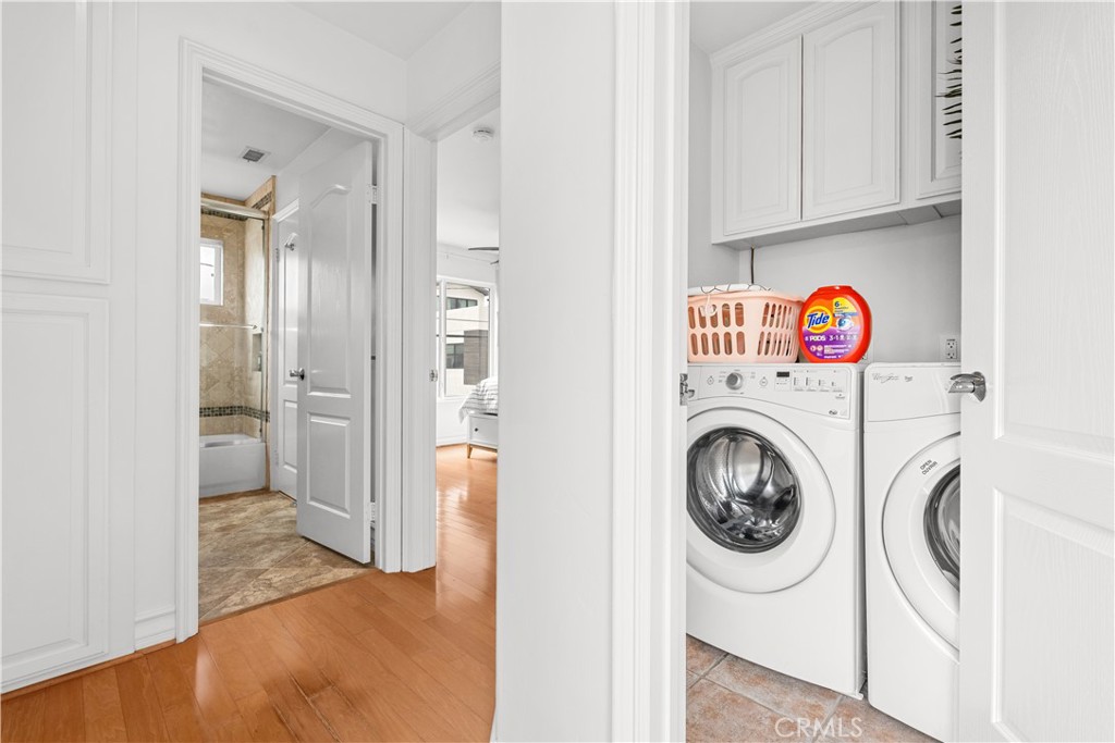 513 Pecan Avenue Huntington Beach, CA 92648 - Photo 32 of 46 a view of a hallway with washer and dryer