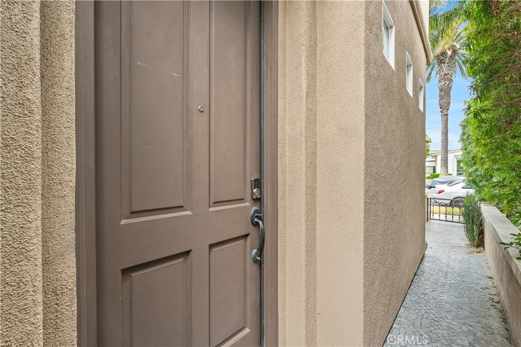 513 Pecan Avenue Huntington Beach, CA 92648 - Photo 44 of 46 a view of a hallway with wooden floor and entryway