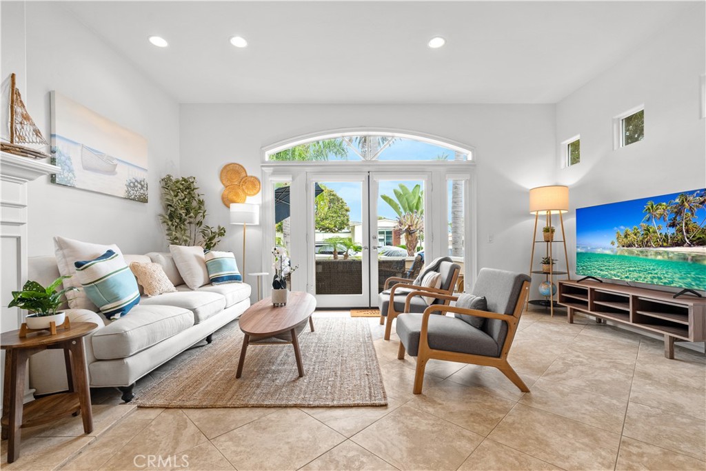 513 Pecan Avenue Huntington Beach, CA 92648 - Photo 7 of 46 a living room with furniture and a flat screen tv