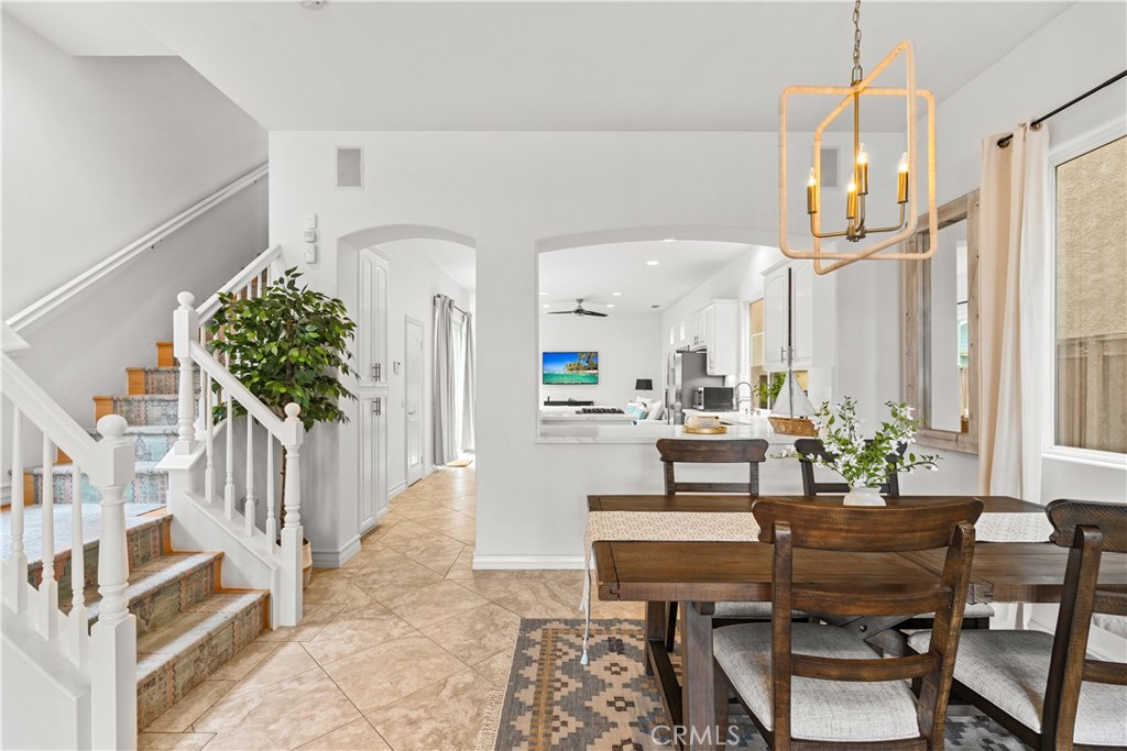 513 Pecan Avenue Huntington Beach, CA 92648 - Photo 10 of 46 a dining room with furniture and window