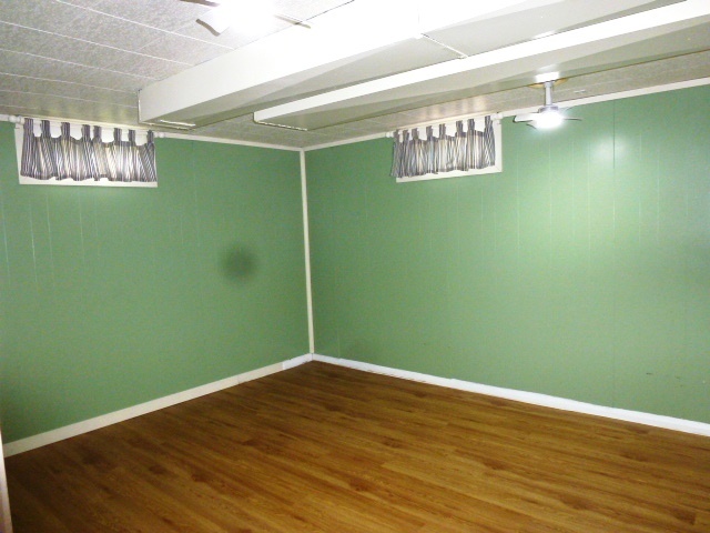 1026 Highway 10 Clinton, IL 61727 - Photo 12 of 20 a view of a room with window and wooden floor