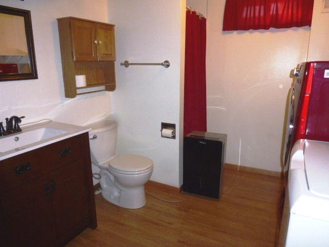 1026 Highway 10 Clinton, IL 61727 - Photo 16 of 20 a bathroom with a sink and a toilet