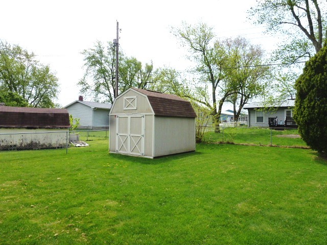 1026 Highway 10 Clinton, IL 61727 - Photo 17 of 20 a view of a house with backyard