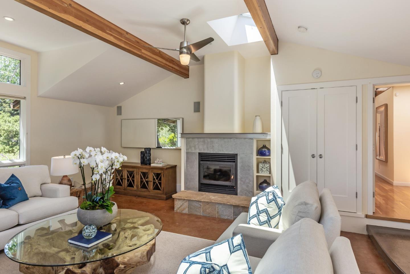 166 Sausal Drive Portola Valley, CA 94028 - Photo 13 of 26 a living room with furniture and a fireplace