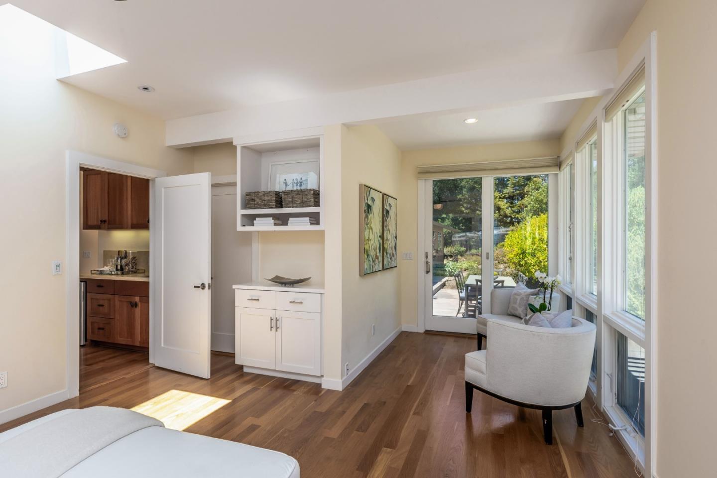 166 Sausal Drive Portola Valley, CA 94028 - Photo 22 of 26 a living room with furniture and a refrigerator