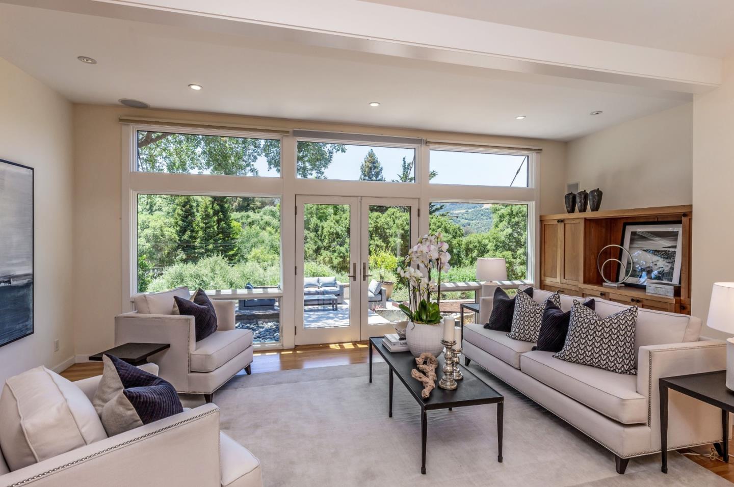 166 Sausal Drive Portola Valley, CA 94028 - Photo 5 of 26 a living room with furniture and a large window