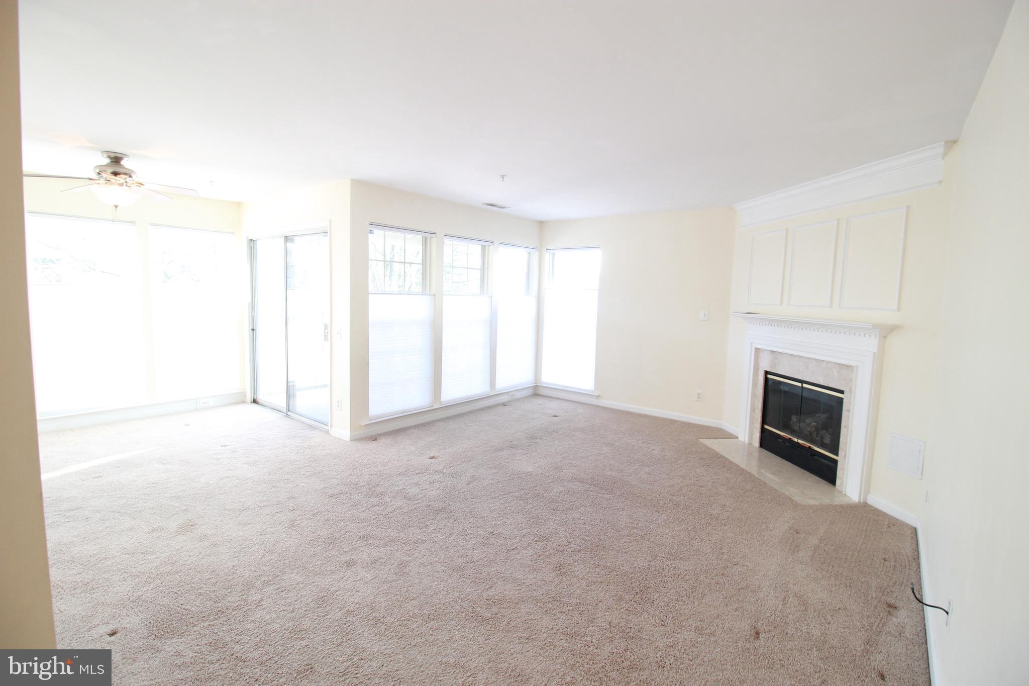 249 Rosebay Court Delran, NJ 08075 - Photo 3 of 16 a view of empty room with a fireplace