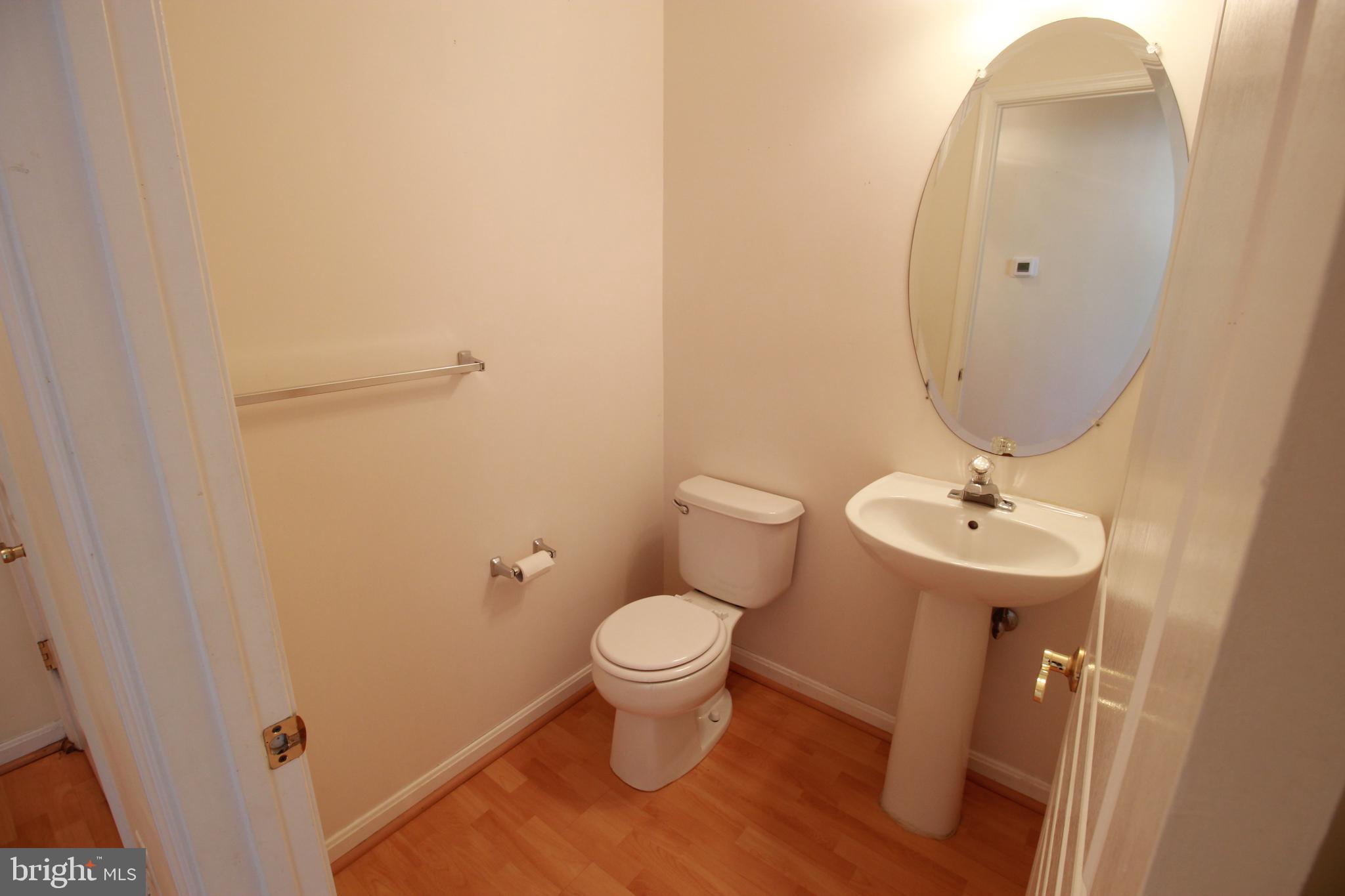 249 Rosebay Court Delran, NJ 08075 - Photo 8 of 16 a bathroom with a sink toilet and a mirror
