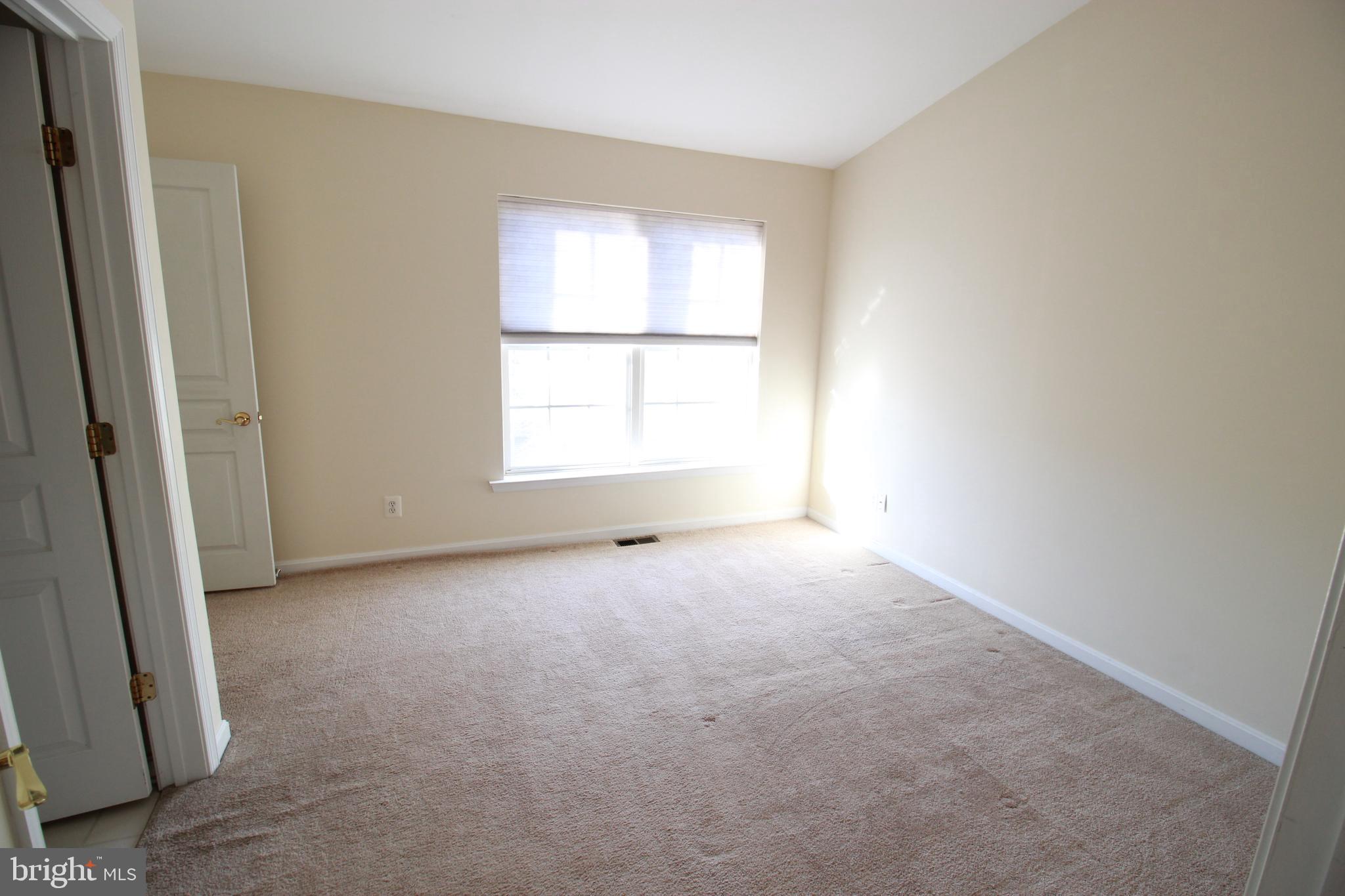 249 Rosebay Court Delran, NJ 08075 - Photo 10 of 16 an empty room with a window