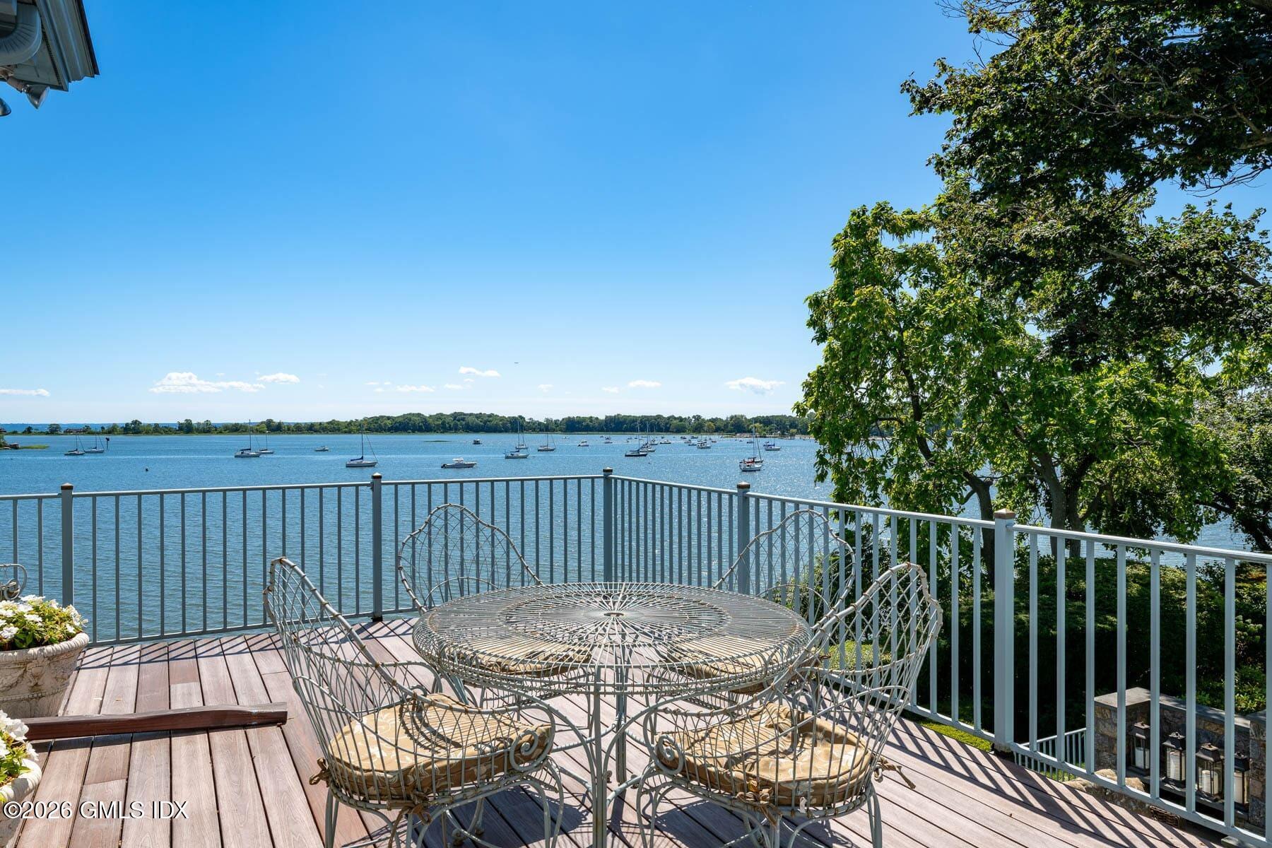 108 Cedar Cliff Road Riverside, CT 06878 - Photo 32 of 49 a view of a wooden deck with furniture