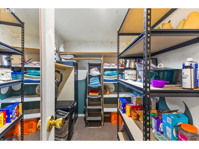 a view of a livingroom with furniture