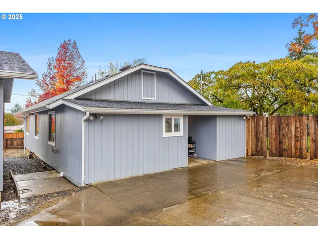a view of a backyard with a garden