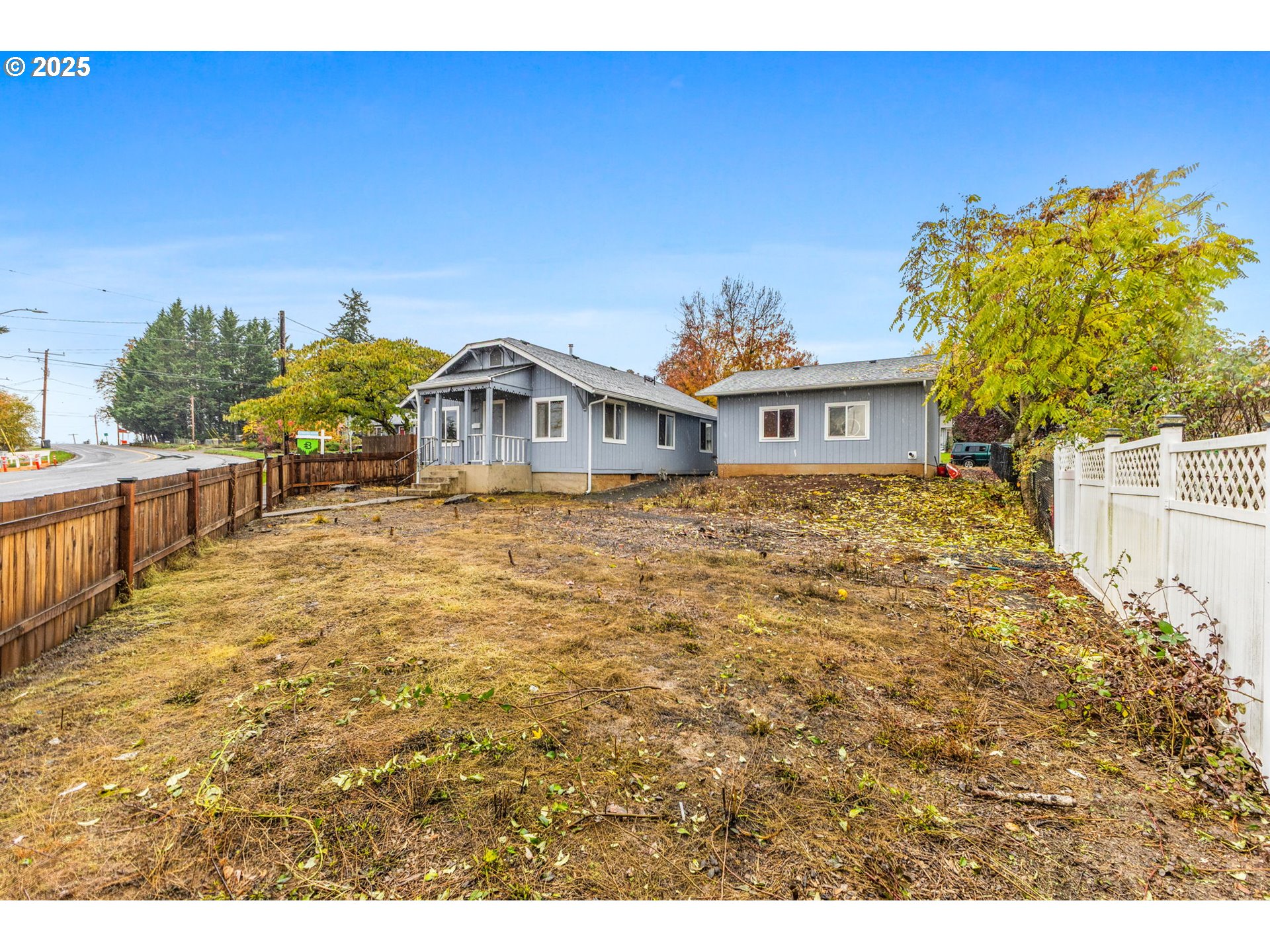 1487 Southwest Fairview Avenue Dallas, OR 97338 - Photo 3 of 34 a front view of a house with a yard