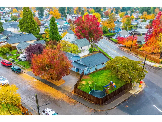 a picture of a room with a white wall and a picture