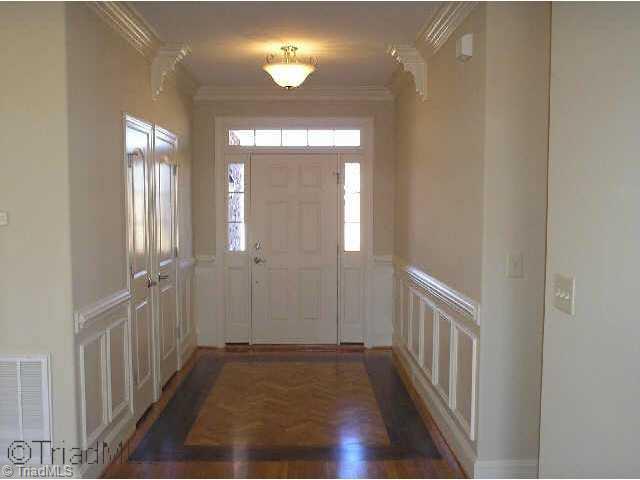 44 The Bluffs Rural Hall, NC 27045 - Photo 2 of 9 Other. The foyer welcomes you into elegance, with hardwood floors, extensive moldings and high ceilings!