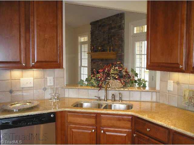 44 The Bluffs Rural Hall, NC 27045 - Photo 5 of 9 Other. Over the sink window in the kitchen, allows the cook to join in the living area conversation.
