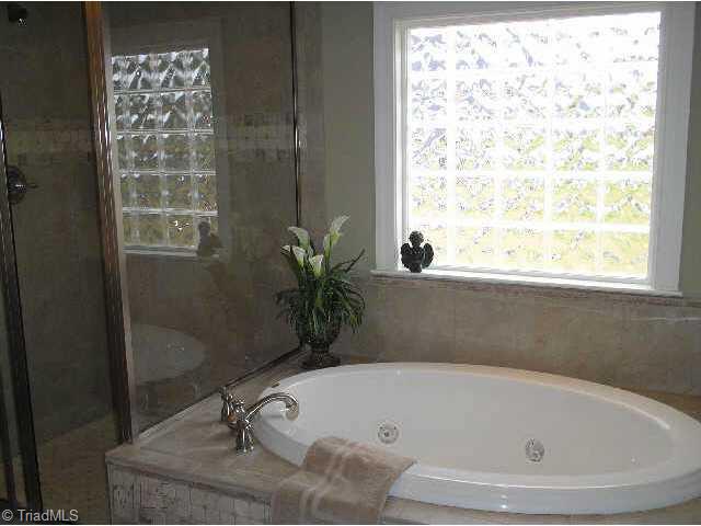 44 The Bluffs Rural Hall, NC 27045 - Photo 8 of 9 Other. Private master bath with jetted tub, block window, dual sinks and tiled shower!