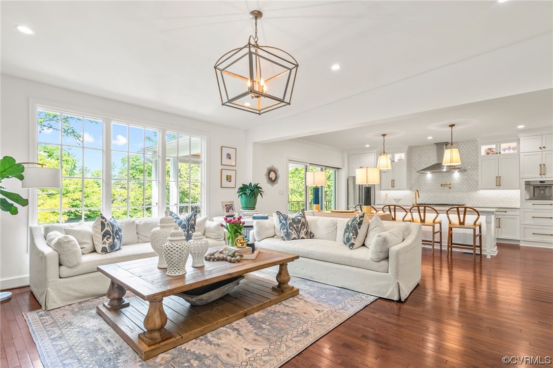 8908 Brieryle Road Henrico, VA 23229 - Photo 14 of 50 a living room with furniture wooden floor and a chandelier