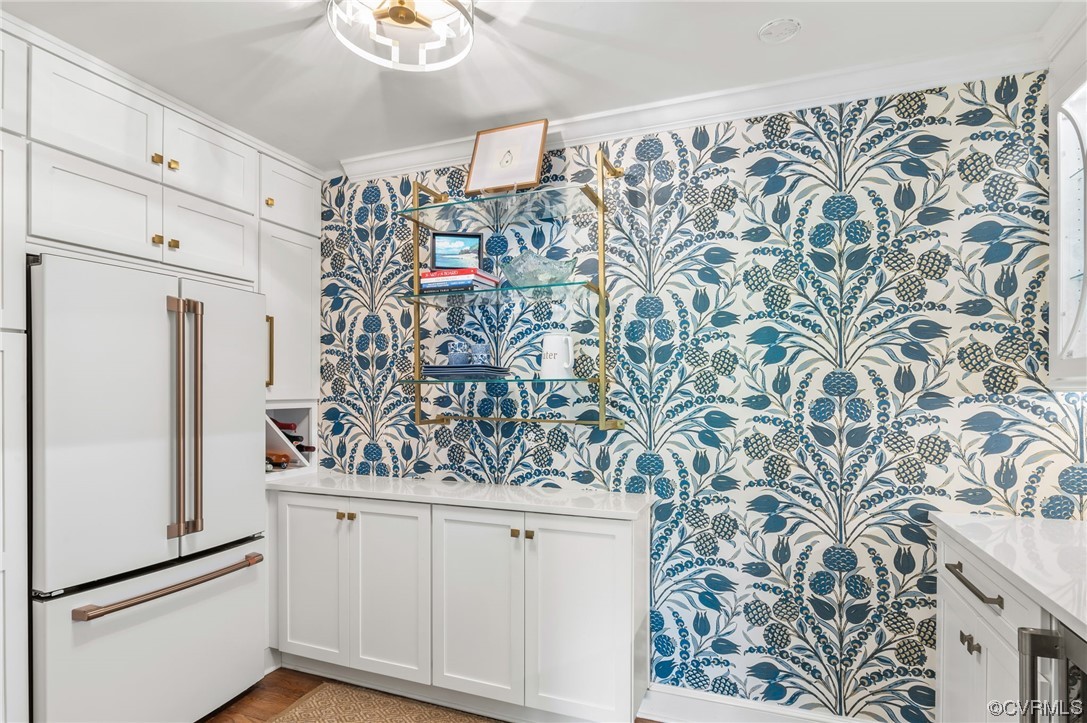 8908 Brieryle Road Henrico, VA 23229 - Photo 19 of 50 a view of a refrigerator with wooden floor