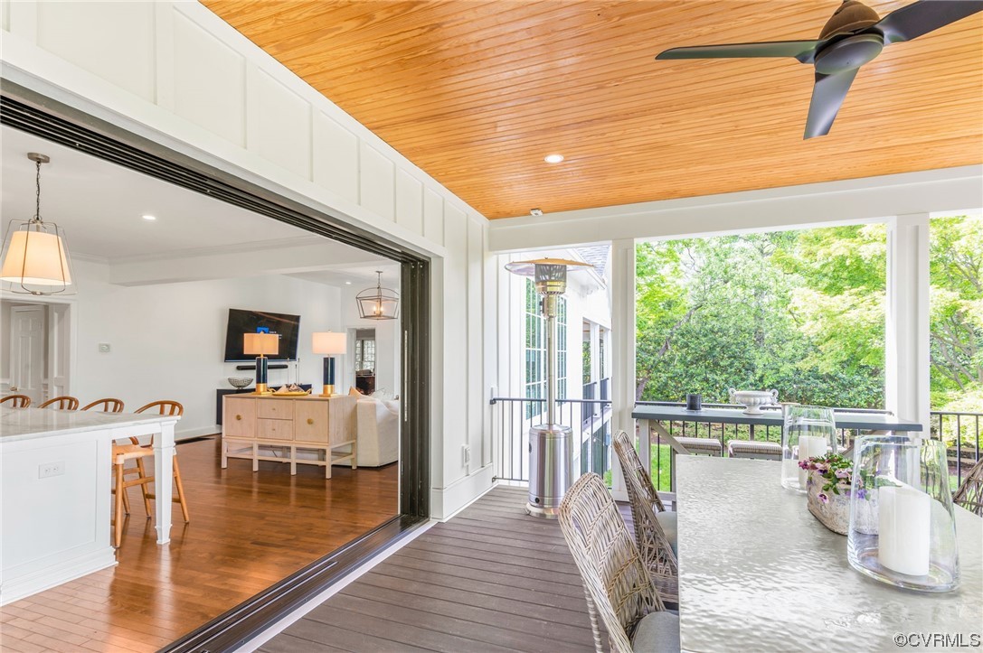 8908 Brieryle Road Henrico, VA 23229 - Photo 22 of 50 a view of a living room and dining room with wooden floor