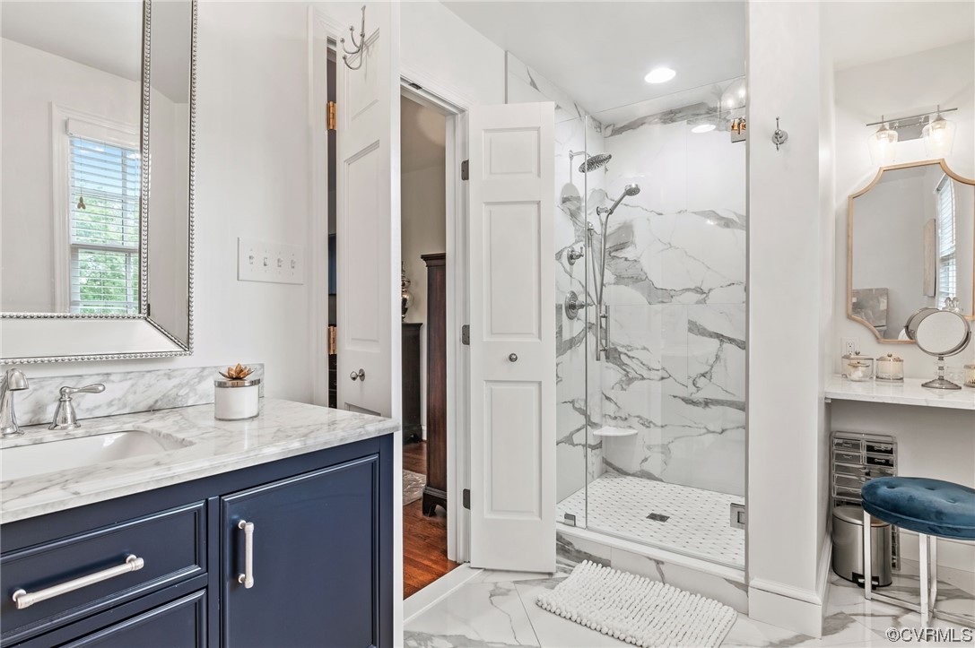 8908 Brieryle Road Henrico, VA 23229 - Photo 30 of 50 a bathroom with a shower sink and mirror