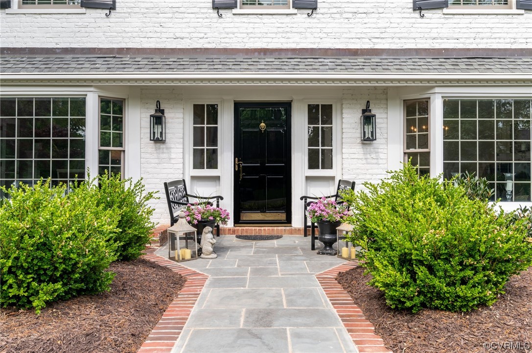 8908 Brieryle Road Henrico, VA 23229 - Photo 3 of 50 a front view of a house with garden