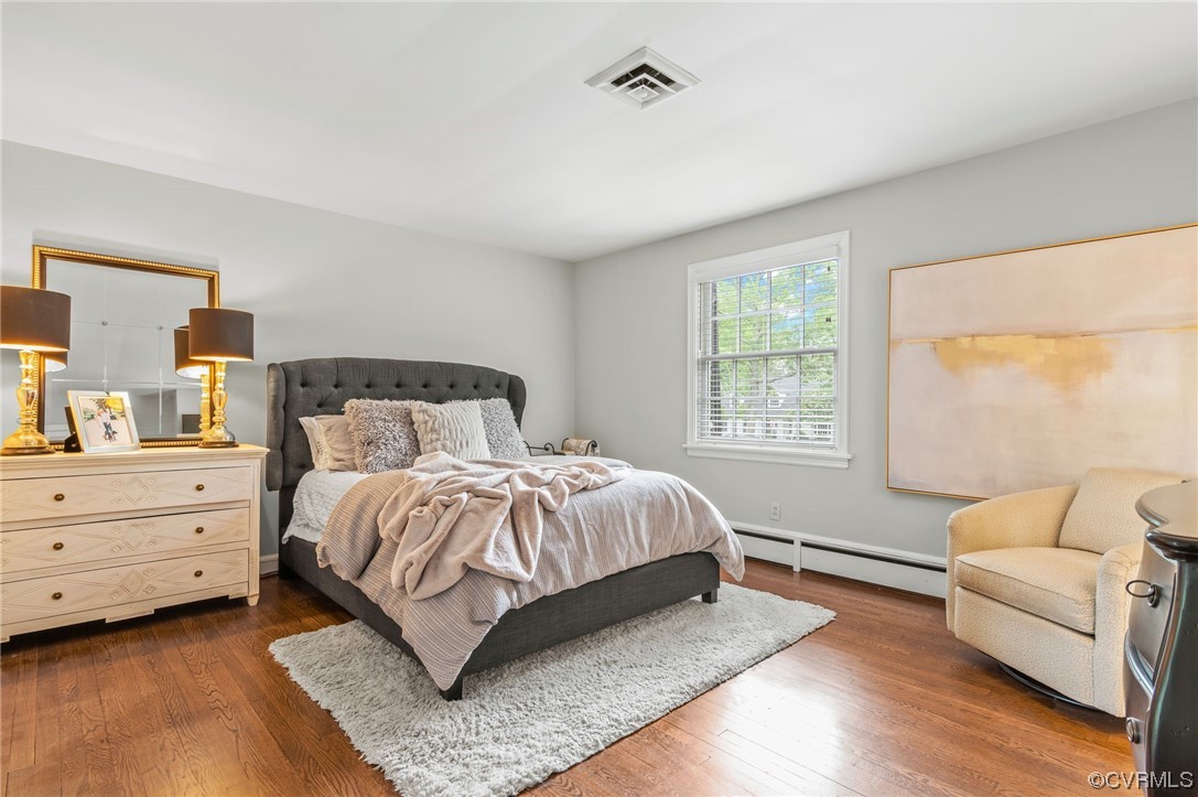 8908 Brieryle Road Henrico, VA 23229 - Photo 31 of 50 a bedroom with a bed and a couch