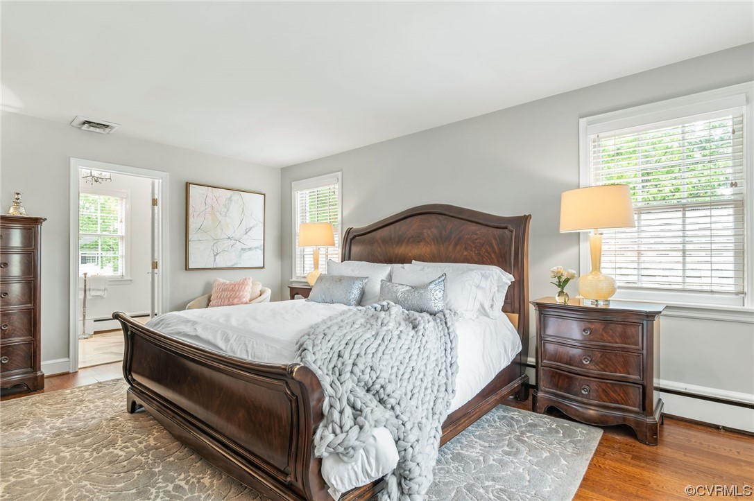 8908 Brieryle Road Henrico, VA 23229 - Photo 33 of 50 a bed sitting in a bedroom next to a window