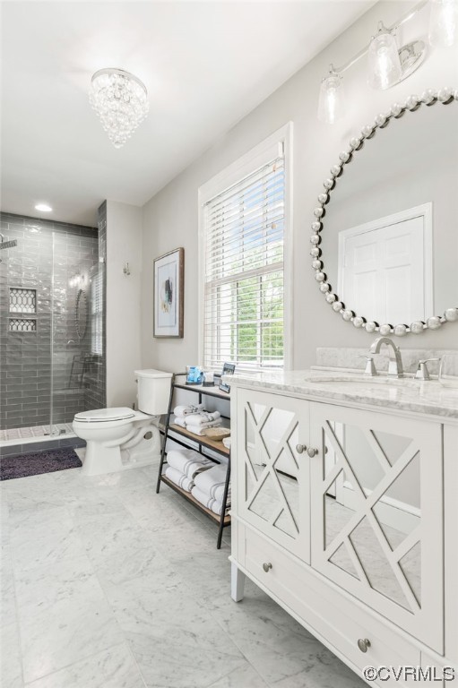 8908 Brieryle Road Henrico, VA 23229 - Photo 34 of 50 a spacious bedroom with a bed a couch and cabinet