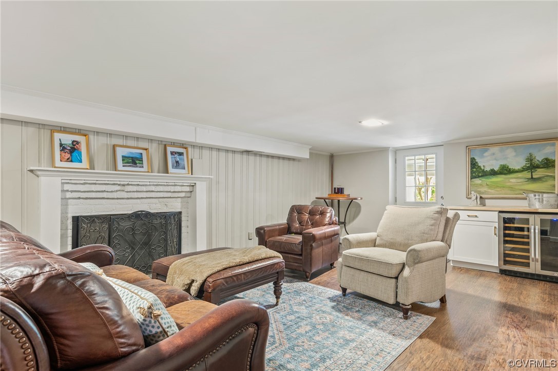 8908 Brieryle Road Henrico, VA 23229 - Photo 36 of 50 a living room with furniture and a fireplace