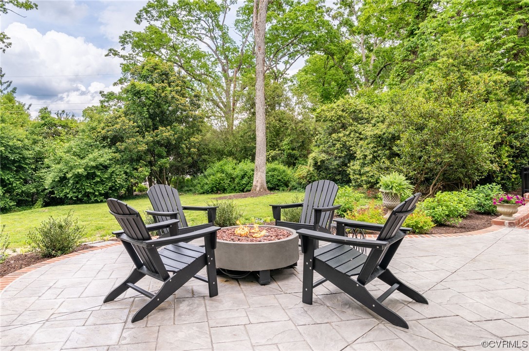 8908 Brieryle Road Henrico, VA 23229 - Photo 41 of 50 a view of a chairs and table in backyard of the house