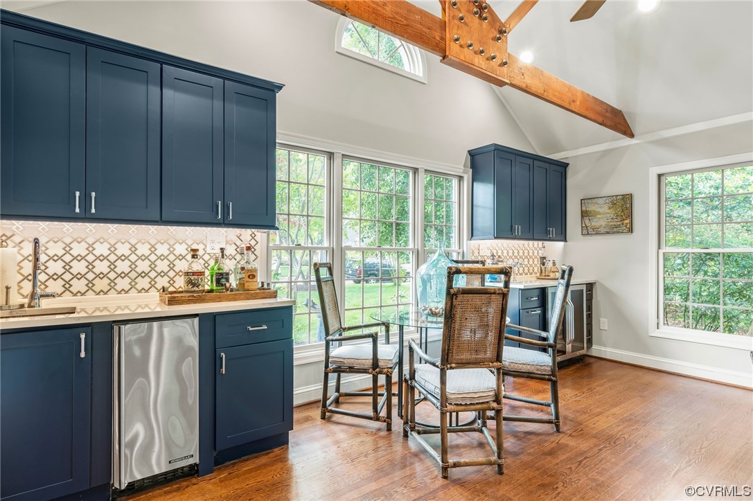 8908 Brieryle Road Henrico, VA 23229 - Photo 8 of 50 a view of a dining room with furniture window and wooden floor