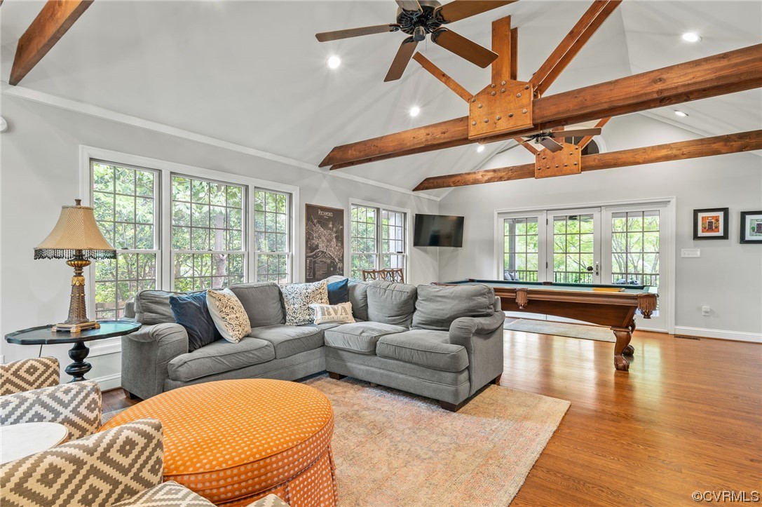 8908 Brieryle Road Henrico, VA 23229 - Photo 9 of 50 a living room with furniture a ceiling fan and a large window