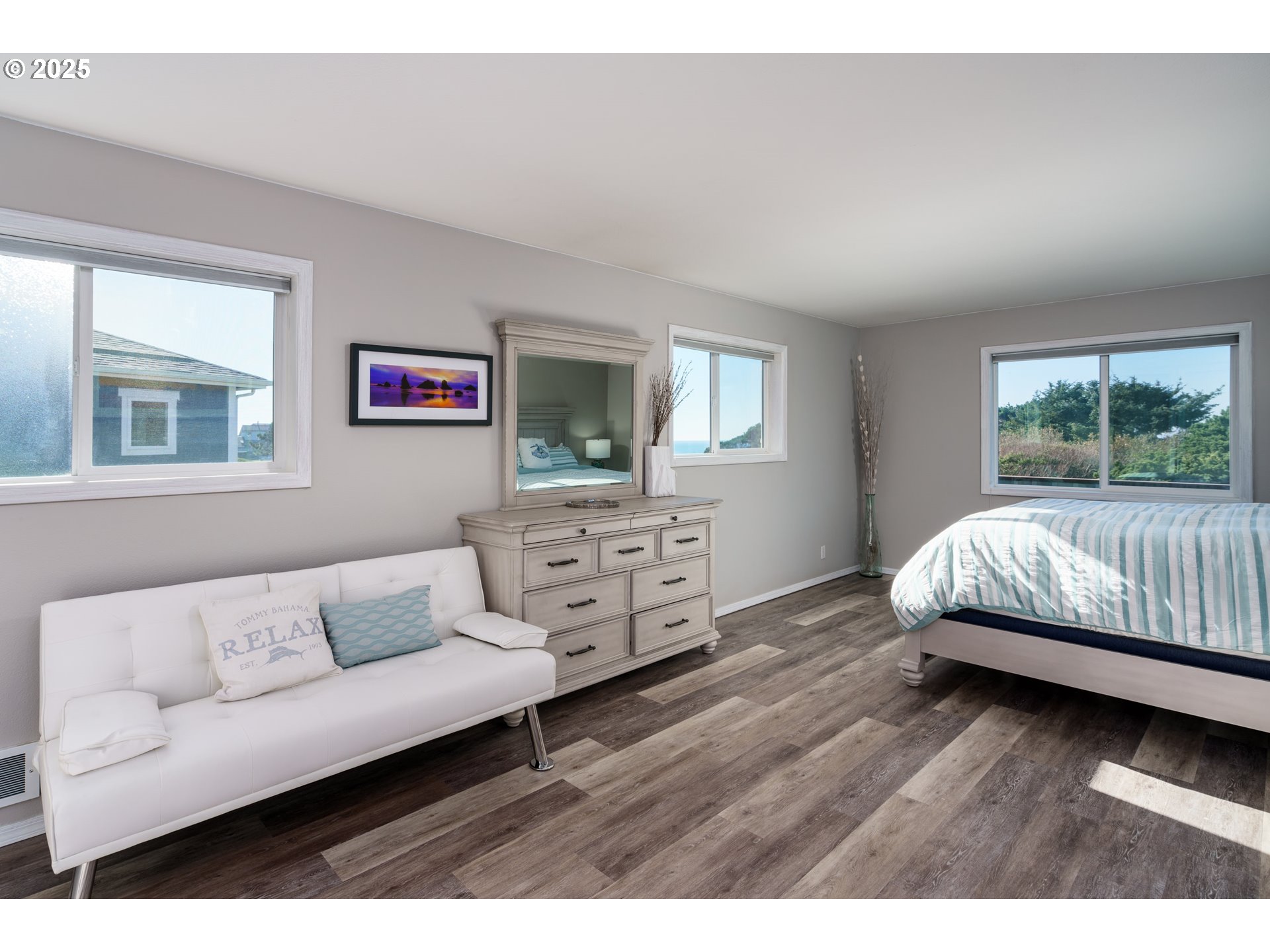 2131 Beach Loop Road Bandon, OR 97411 - Photo 16 of 32 a living room with furniture and a flat screen tv