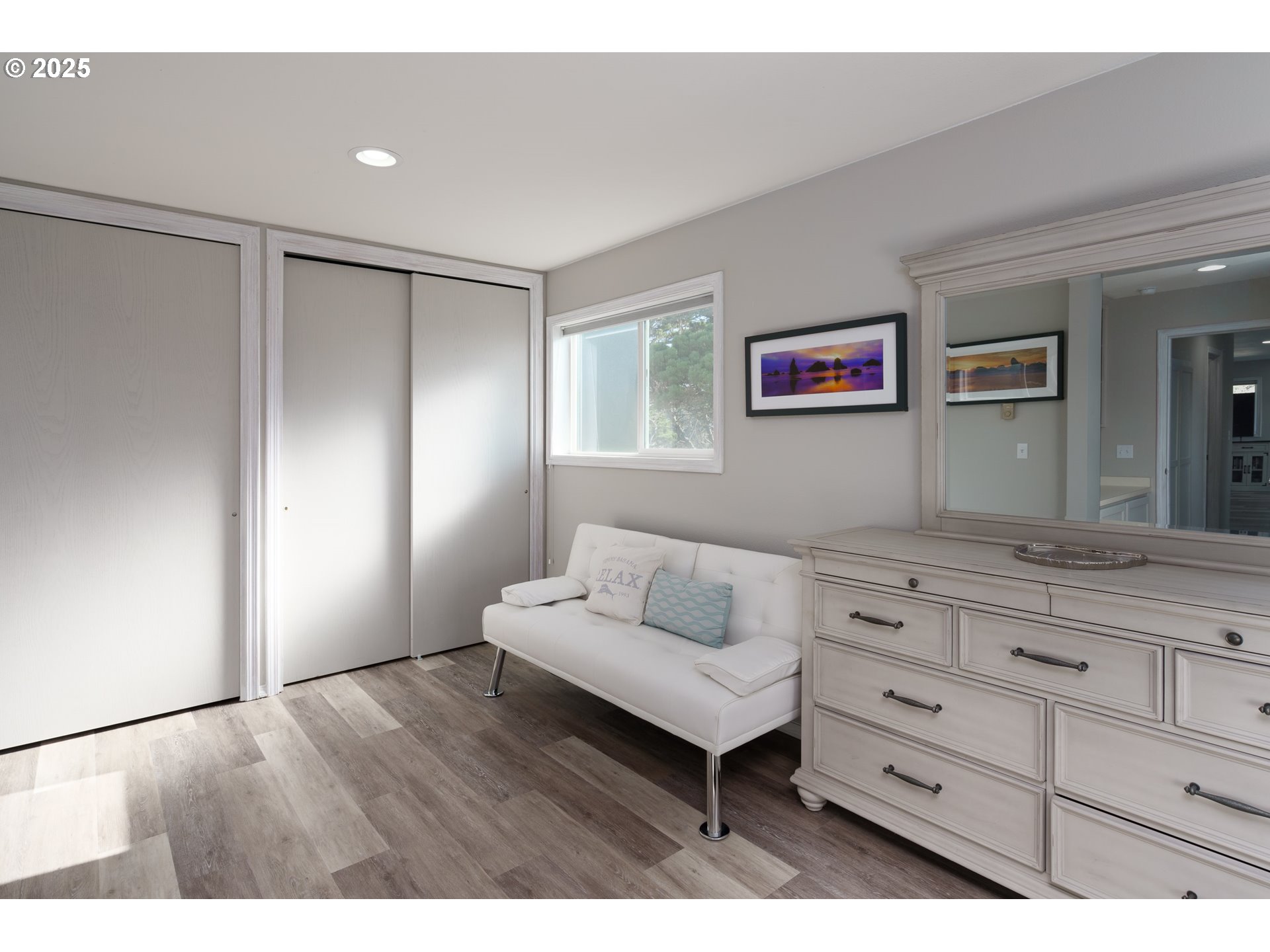 2131 Beach Loop Road Bandon, OR 97411 - Photo 18 of 32 a living room with furniture and a dresser