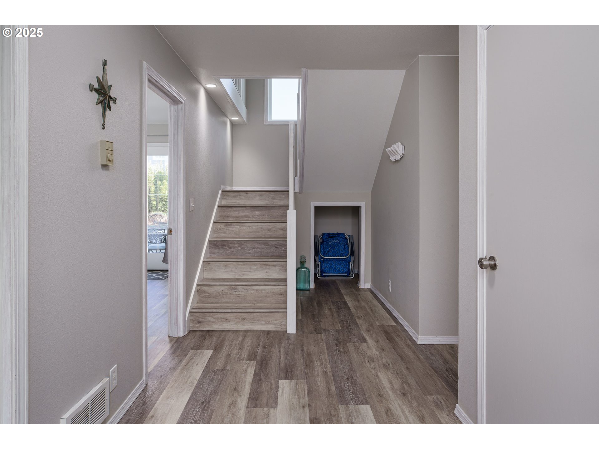 2131 Beach Loop Road Bandon, OR 97411 - Photo 22 of 32 a view of an entryway with wooden floor