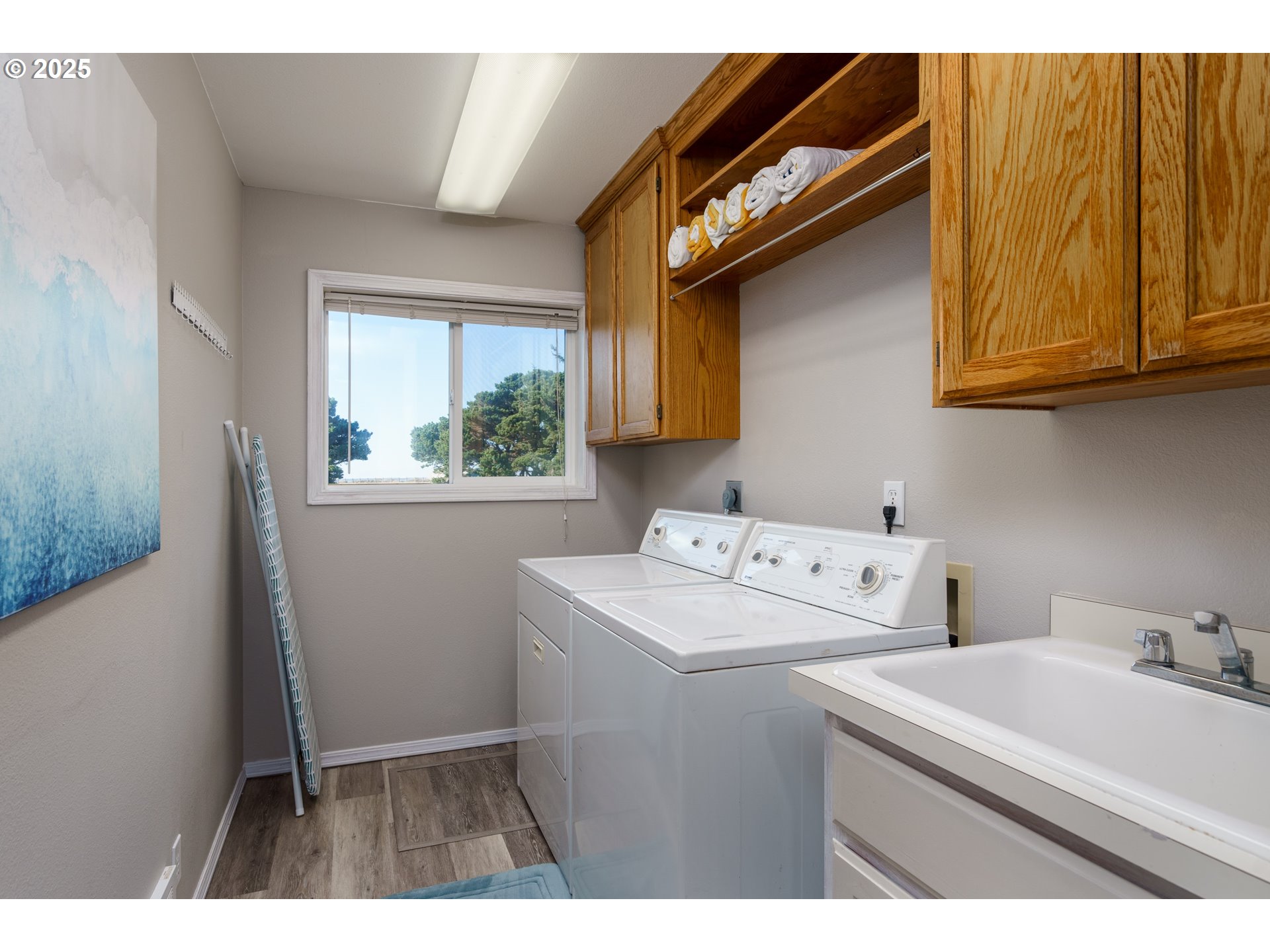 2131 Beach Loop Road Bandon, OR 97411 - Photo 27 of 32 a utility room with dryer and washer