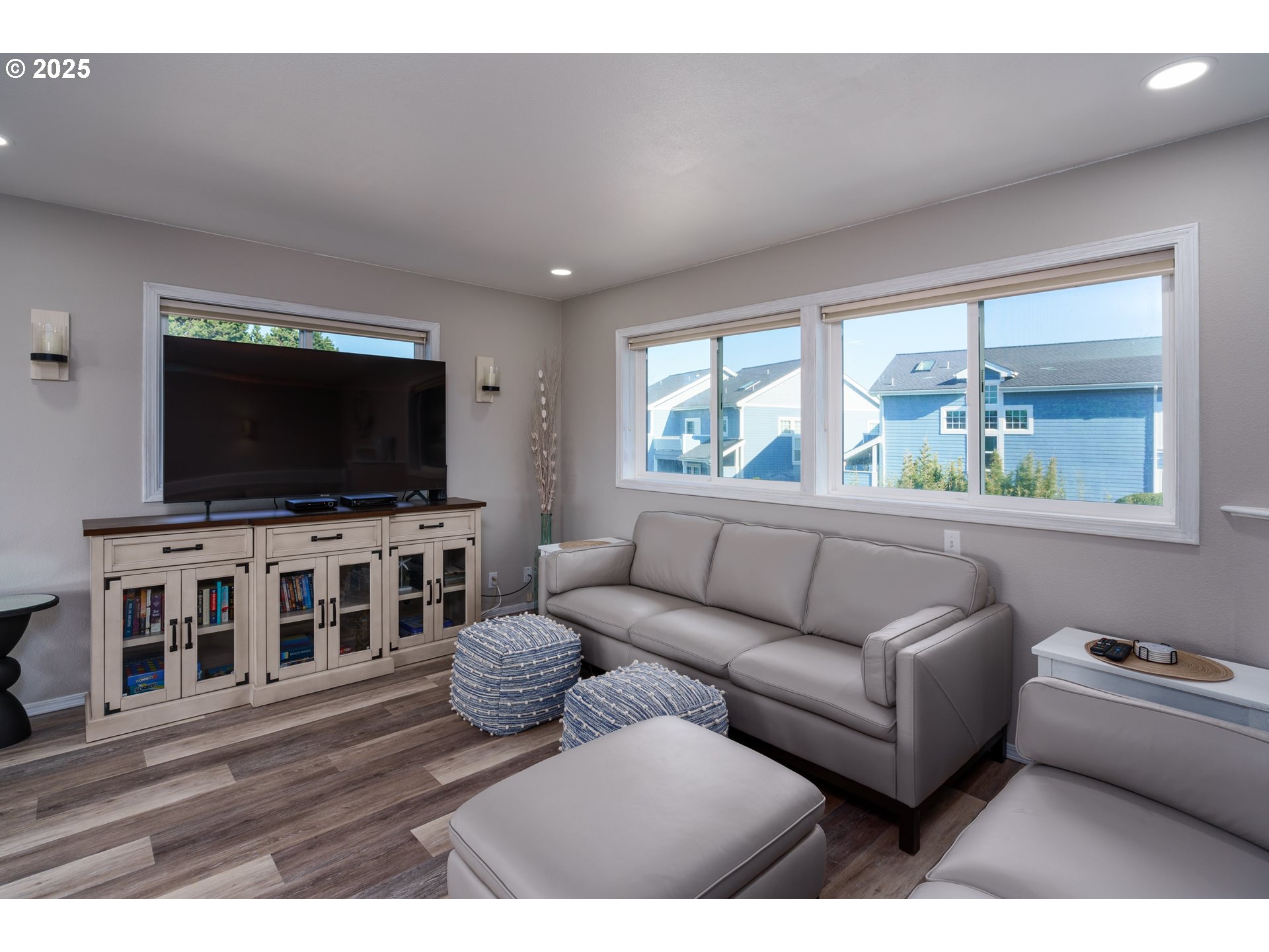2131 Beach Loop Road Bandon, OR 97411 - Photo 5 of 32 a living room with furniture and a flat screen tv